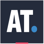 White capital letters AT followed by a blue dot on a dark navy square background, with a small pink rectangle centered at the bottom edge of the square.